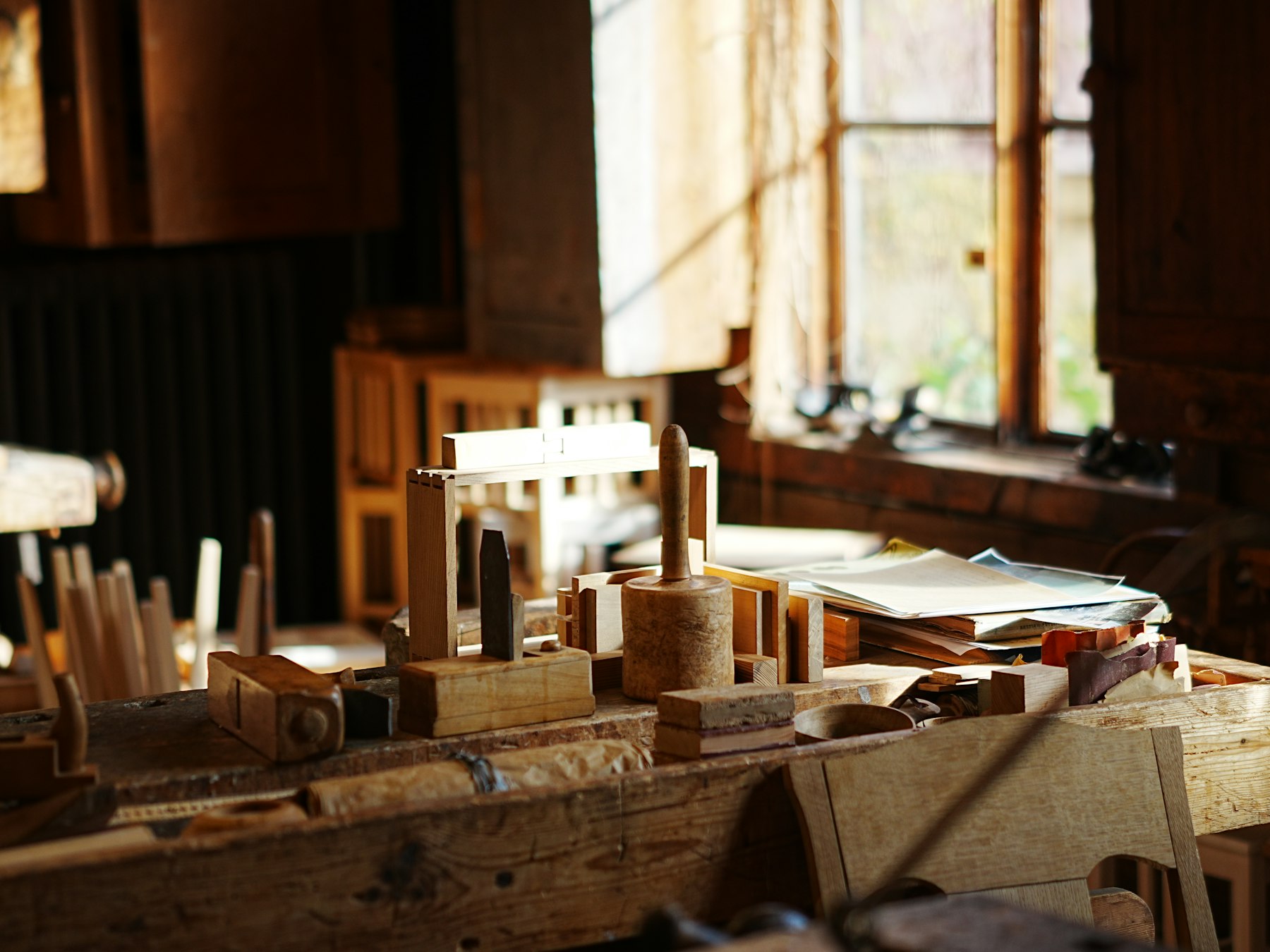 Woodworking tools laid on a workbench